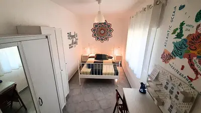Letto o letti in una camera di La stanza di Daria - un nido silenzioso nel cuore del centro storico