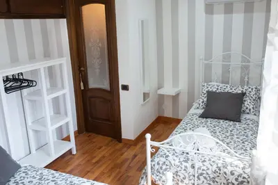 Letto o letti in una camera di Dimora De Curtis