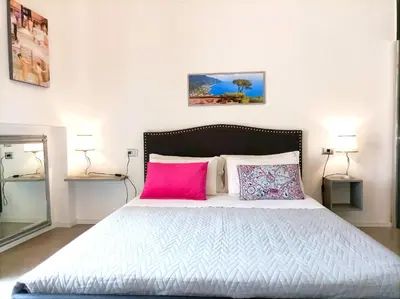 Letto o letti in una camera di Symposion B&B Apart