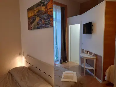 Letto o letti in una camera di BelloBello Rooms&Apartment