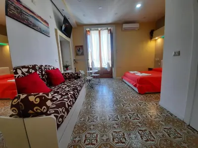 Letto o letti in una camera di BelloBello Rooms&Apartment