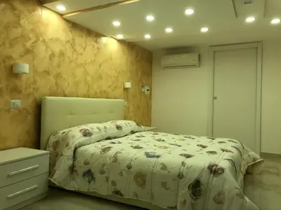 Letto o letti in una camera di Sole House