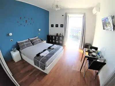 Letto o letti in una camera di B&B Musica e Mare