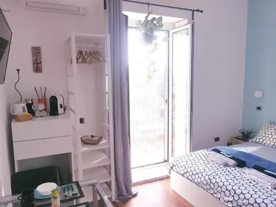 Letto o letti in una camera di B&B Musica e Mare