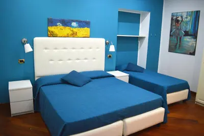 Letto o letti in una camera di B&B Museum