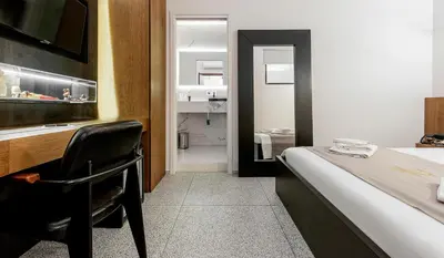 Letto o letti in una camera di Annunziata Guesthouse, Centro Storico