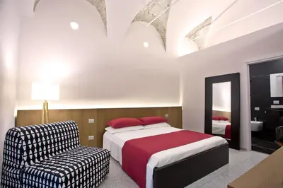 Letto o letti in una camera di Annunziata Guesthouse, Centro Storico