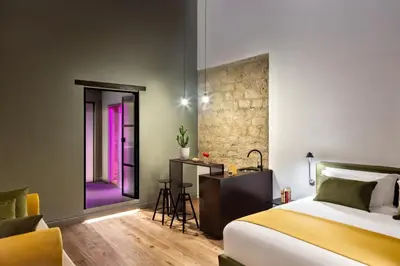 Letto o letti in una camera di Artemisia Domus - Centro Storico