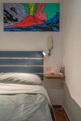 Letto o letti in una camera di DonnaRé Casavacanza - Historic Center of Naples
