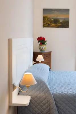 Letto o letti in una camera di B&B Supportico Lopez