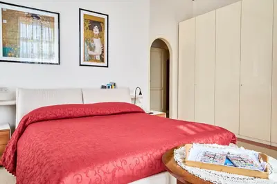 Letto o letti in una camera di Suite Klimt P.zza Amedeo