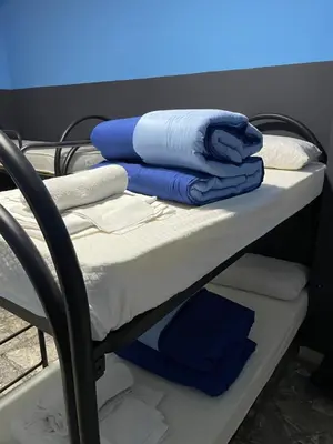 Letto o letti in una camera di Alexander hostel