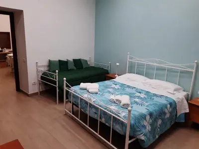 Letto o letti in una camera di Casa vacanze Napoli Centro Carmen & Sara