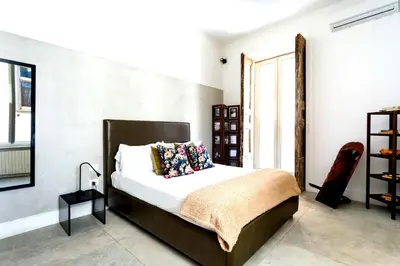 Letto o letti in una camera di Casa dei Mille Napoli