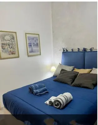 Letto o letti in una camera di Vomero House with Free Parking 410 cm