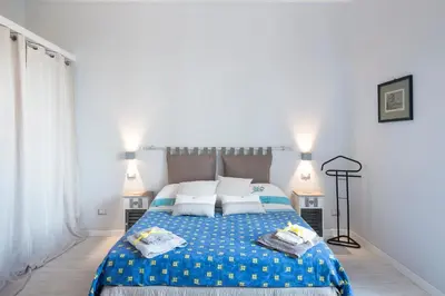 Letto o letti in una camera di La Casa del Faro 31