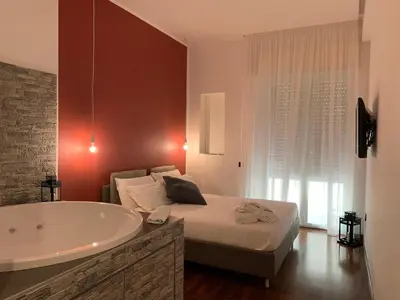 Letto o letti in una camera di Cellamare Suite & Spa