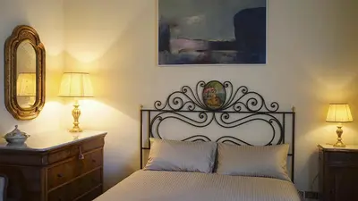 Letto o letti in una camera di Calabritto Suite