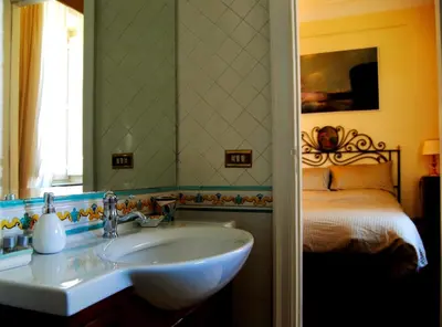 Letto o letti in una camera di Calabritto Suite