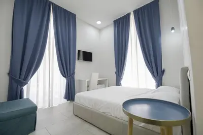 Letto o letti in una camera di La Chambre