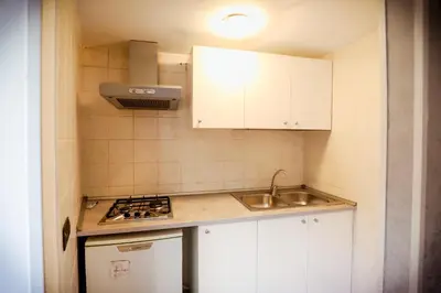Cucina o angolo cottura di La casa di Zucca sopra piazza Plebiscito!