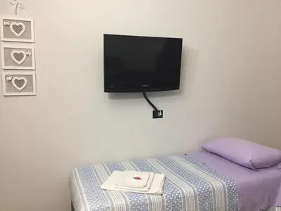 Letto o letti in una camera di Mapi Room