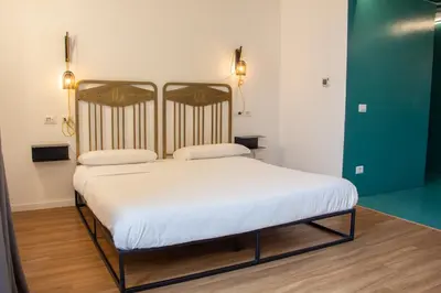 Letto o letti in una camera di Tutt 'e Sant Luxury Rooms