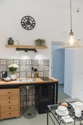 Cucina o angolo cottura di A Misura Duomo Rooms & Apartment - LS Accommodations