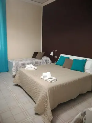 Letto o letti in una camera di Domus Mea Apartment