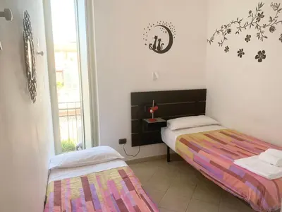 Letto o letti in una camera di Casa di Carlo al Vomero