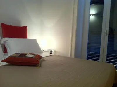 Letto o letti in una camera di iBed Napoli B&B