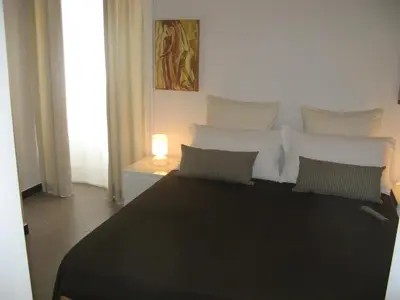 Letto o letti in una camera di iBed Napoli B&B