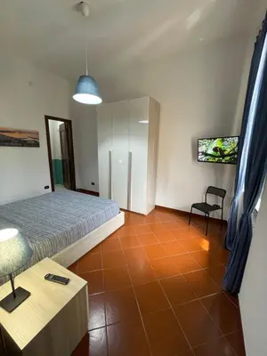 Letto o letti in una camera di Dante Rooms
