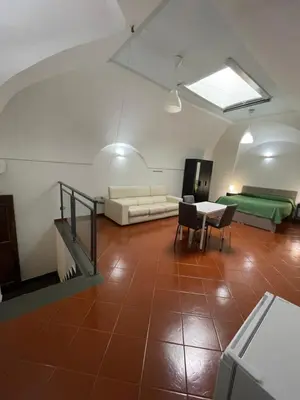 Area soggiorno di Dante Rooms