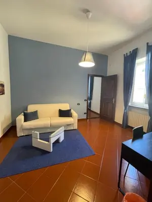 Area soggiorno di Dante Rooms