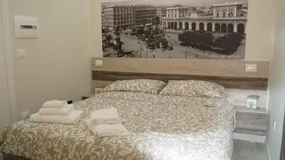 Letto o letti in una camera di Donna Vicenza Bed & Breakfast