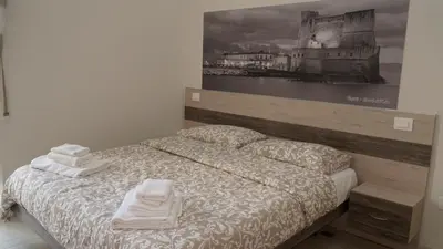 Letto o letti in una camera di Donna Vicenza Bed & Breakfast