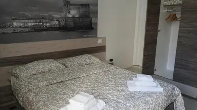 Letto o letti in una camera di Donna Vicenza Bed & Breakfast