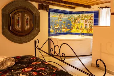 Letto o letti in una camera di Suite Piazza del Gesù By DomusExtra
