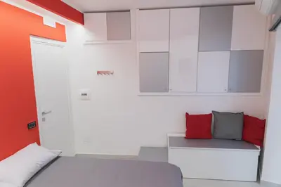 Letto o letti in una camera di Napoli Capitale