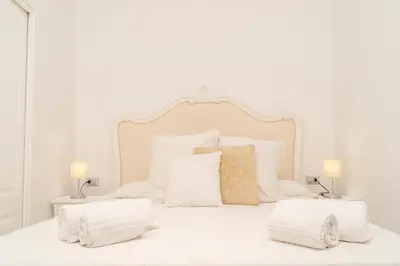 Letto o letti in una camera di NapulitanDream