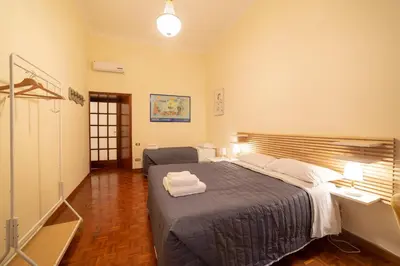 Letto o letti in una camera di The Dante Apartment By HouseinNaples