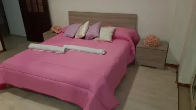 Letto o letti in una camera di B&B Belvedere