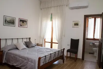 Letto o letti in una camera di Easy House