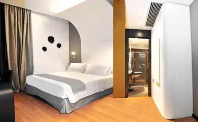 Letto o letti in una camera di Culture Hotel Centro Storico