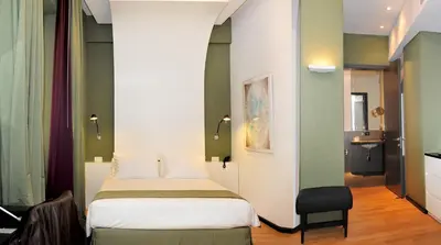 Letto o letti in una camera di Culture Hotel Centro Storico