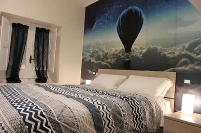 Letto o letti in una camera di Napoli a Chiaia