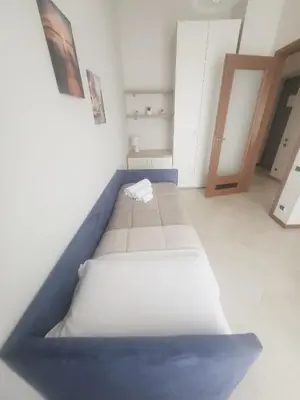 Letto o letti in una camera di Appartamenti Le Gemme