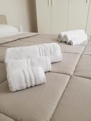 Letto o letti in una camera di Appartamenti Le Gemme