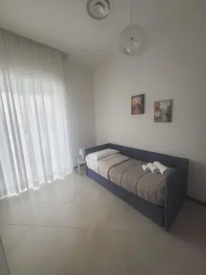 Letto o letti in una camera di Appartamenti Le Gemme